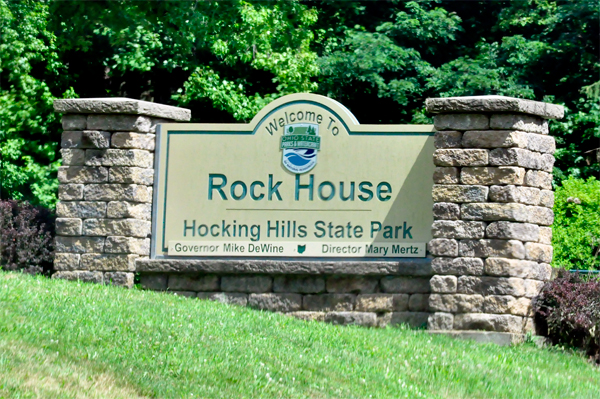 Welcome To The Rock House sign